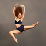 Belén Pereyra flying through the air.